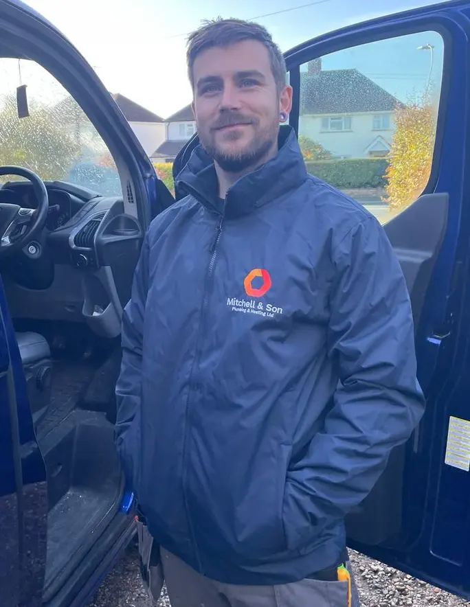 Customer Plumber wearing custom logo winter jacket